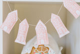 Pink gingerbread house bunting